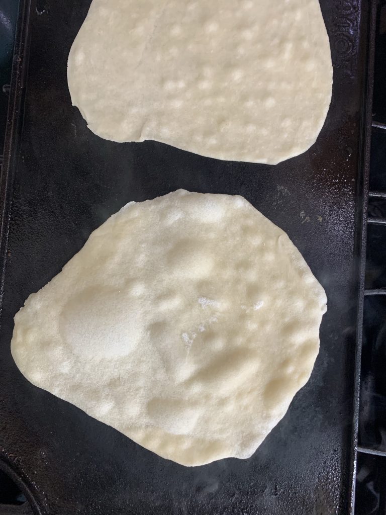 tortillas cooking on my cast iron griddle